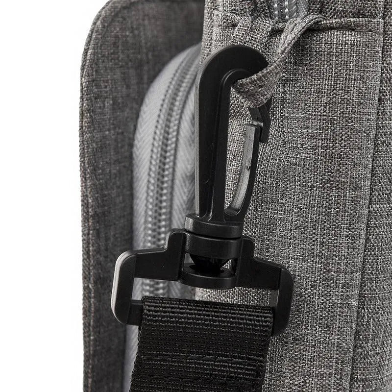 The buckle of the city bag's shoulder strap